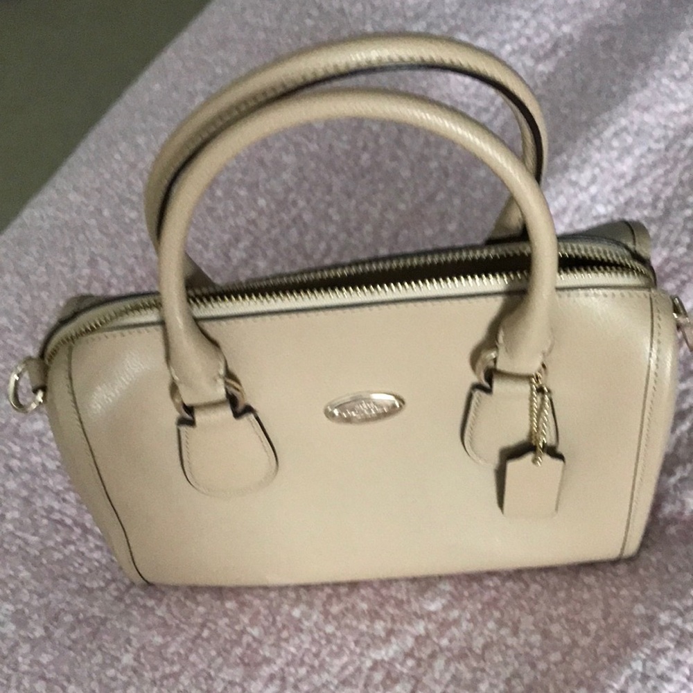 Coach tan leather mini crossbody style purse handbag. Light tan